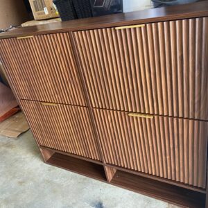 Shoe Storage Cabinet for Entryway with Fluted Wood Design and GOld Pulls. 47x9.5x40"H