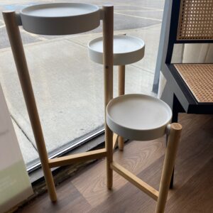 White plant stand on wood base. 31”H, 19”D